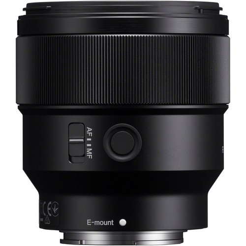 Side profile of the Sony FE 85mm f/1.8 showing the focus ring and switches