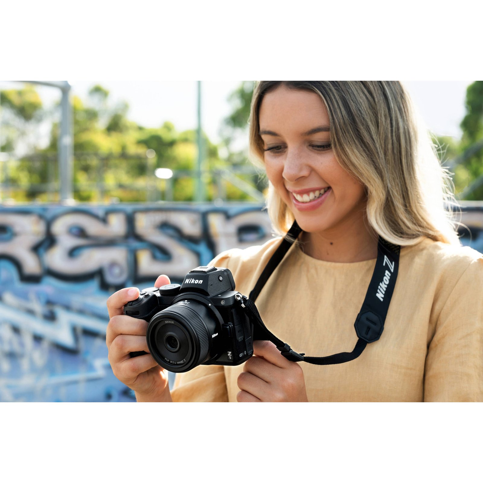 Compact Nikon Z 28mm f/2.8 mounted on a Z body for street shooting