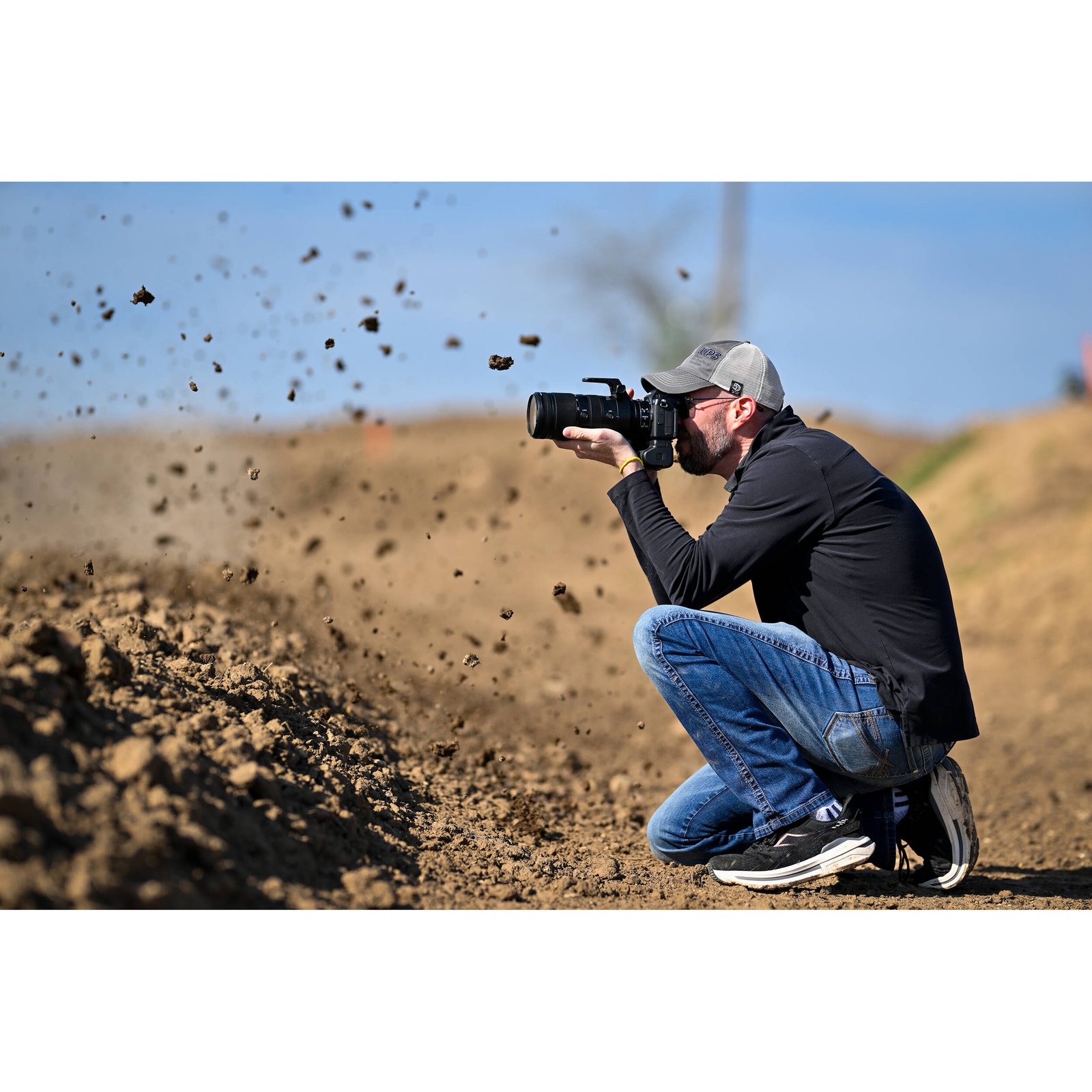 The Nikon Z6 III held in hand showing its grip and size