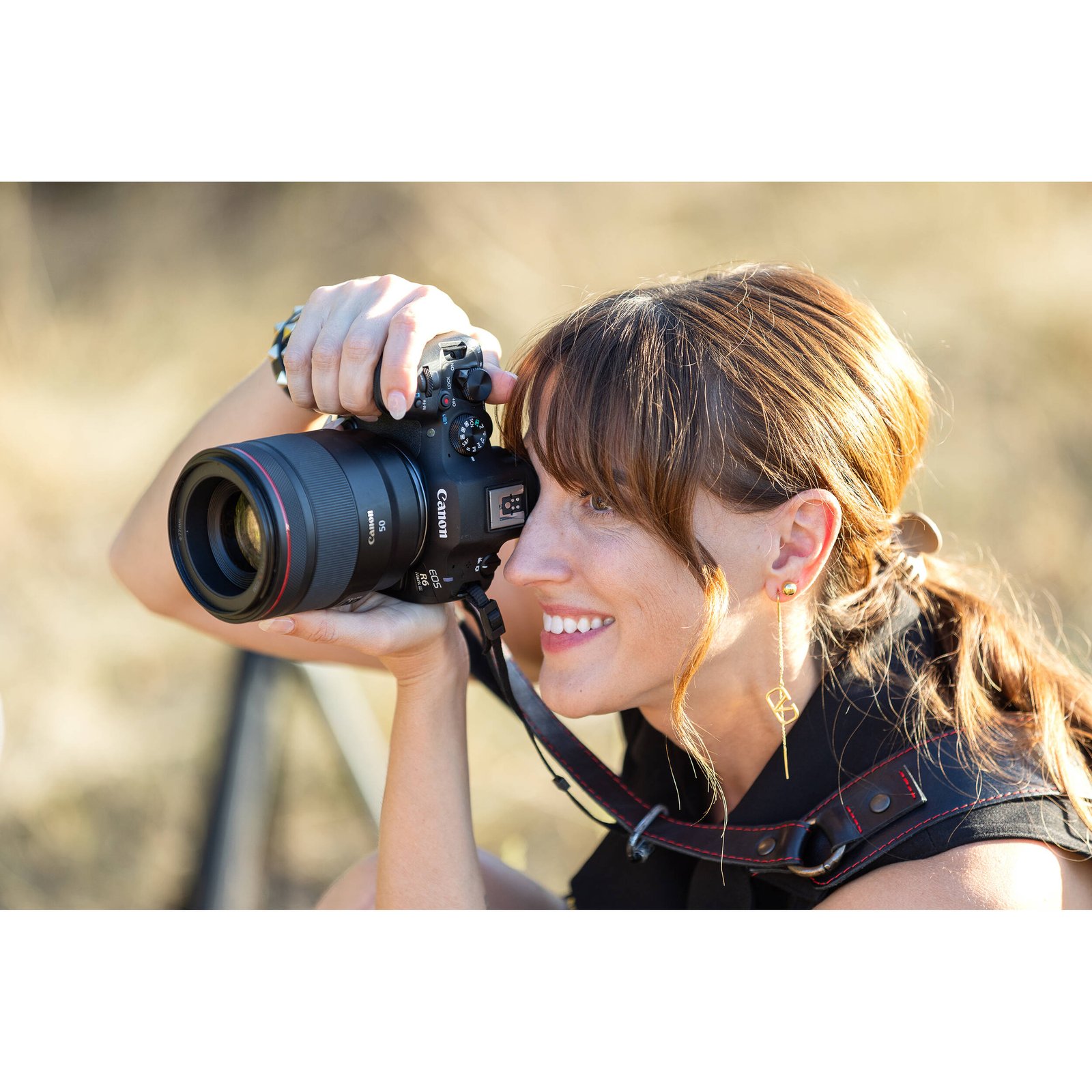 Photographer in Beirut holding the Canon EOS R6 Mark III Mirrorless Camera to show its grip and size