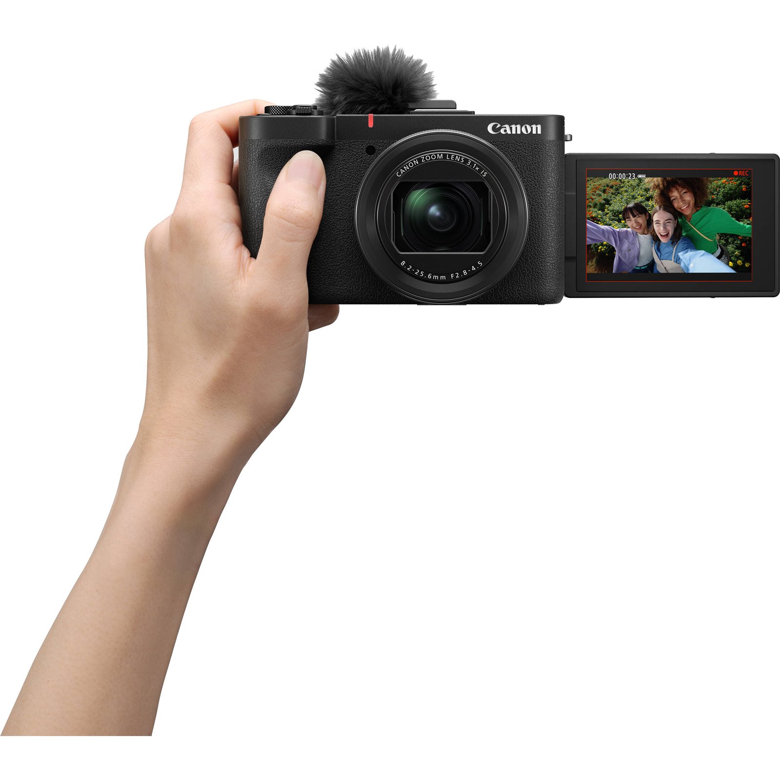 Pocket-sized Canon PowerShot V1 Digital Camera held in hand